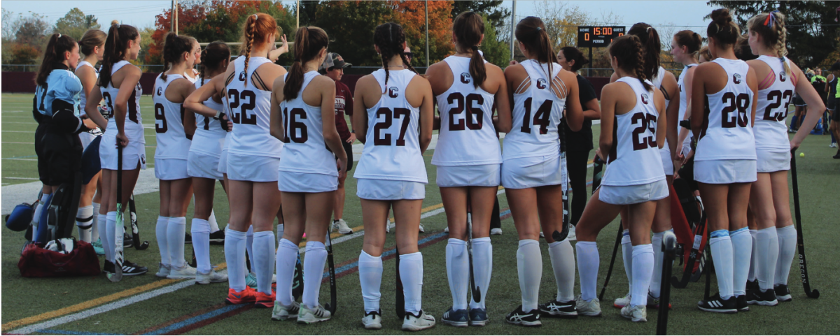 Team+talks%3A+The+girls%E2%80%99+varsity+field+hockey+team+huddles+together+before+the+second+half+of+the+Oct.+27+game+against+Great+Valley+High+School.+They+won+the+Central+League+and+claimed+the+No.+13+spot+in+the+country.